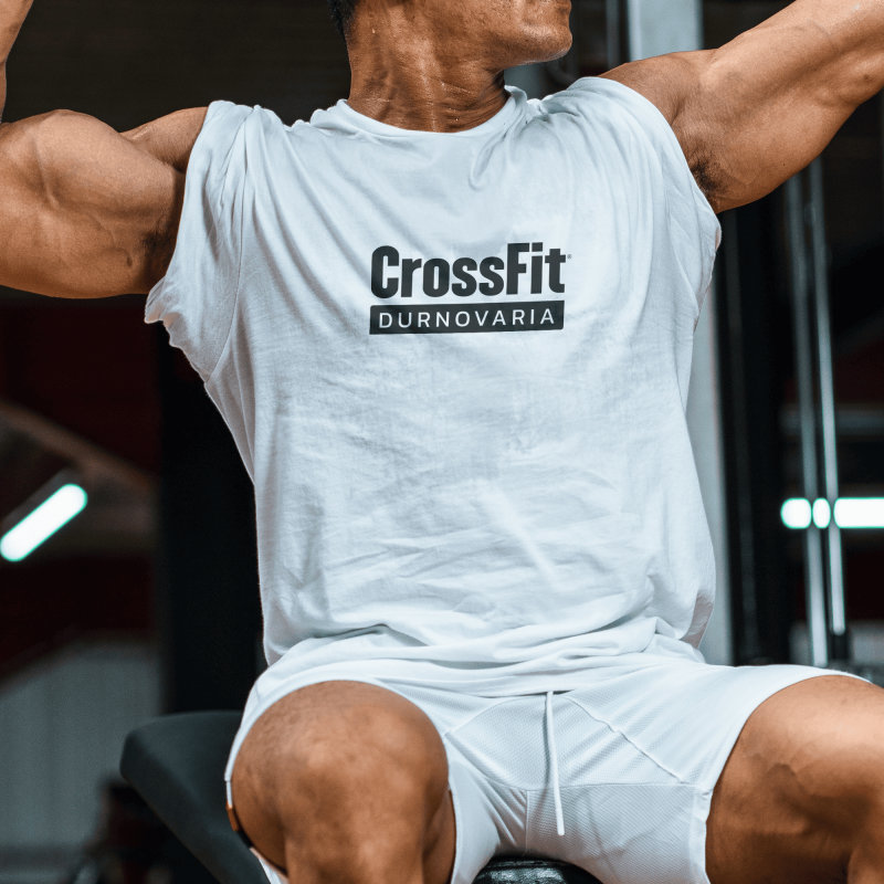 A man wearing the Crossfit Men Gym Comfy Shirt doing CrossFit exercises in a gym in Dorchester, Dorset.
